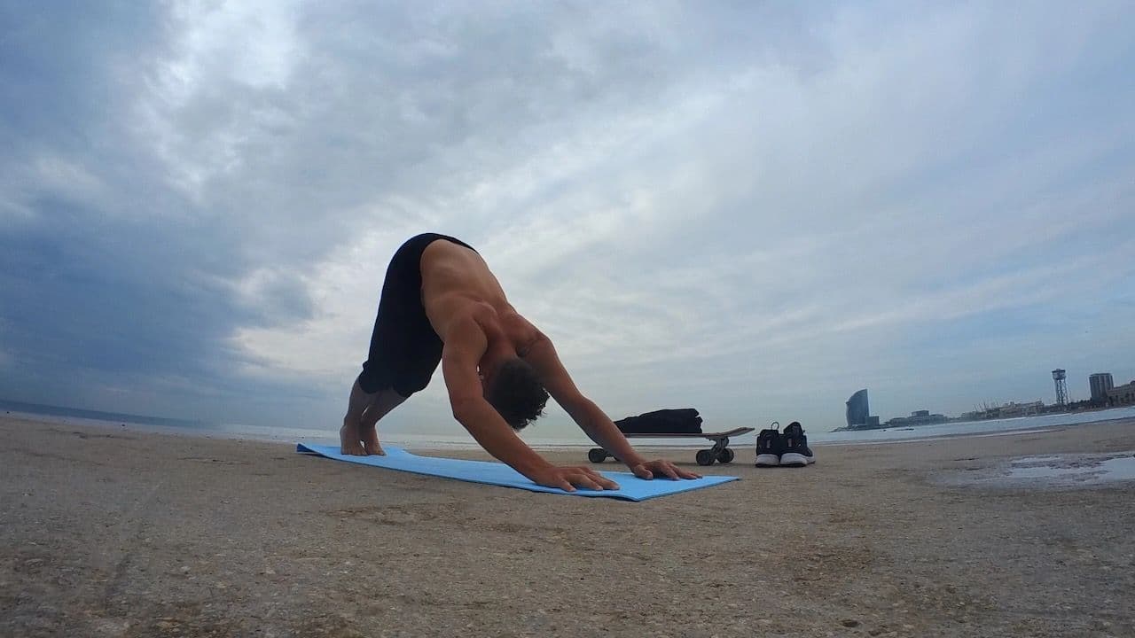 Yoga on the beach at dawn